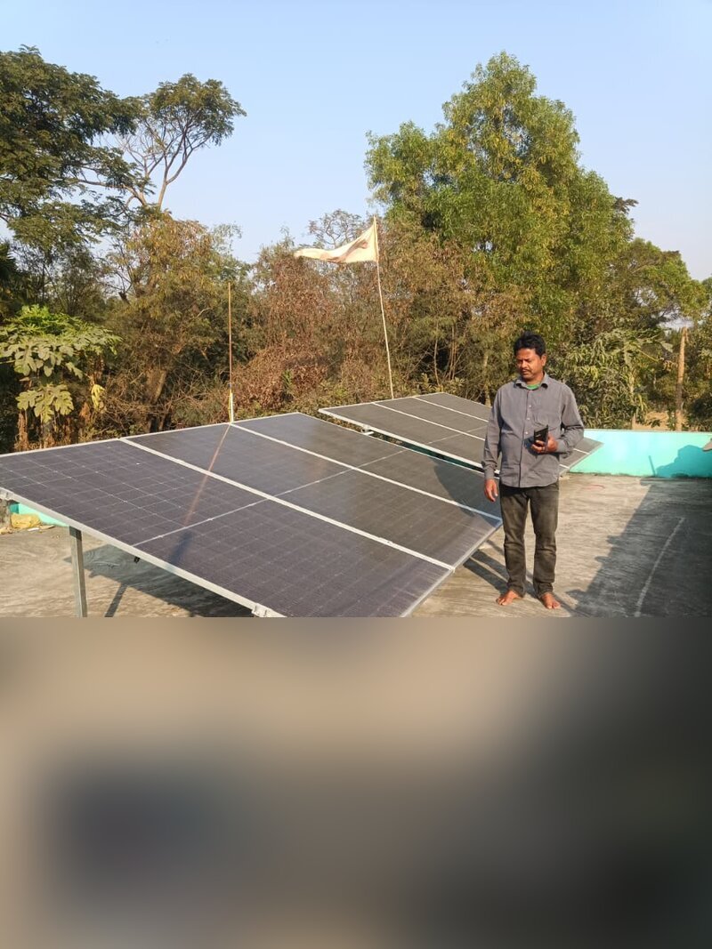 Solar panel installation with technician