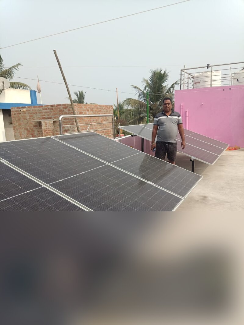 Solar panels with client at residence