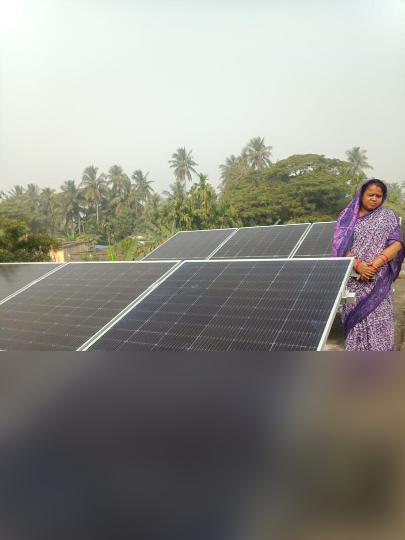 Solar panels with client on rooftop