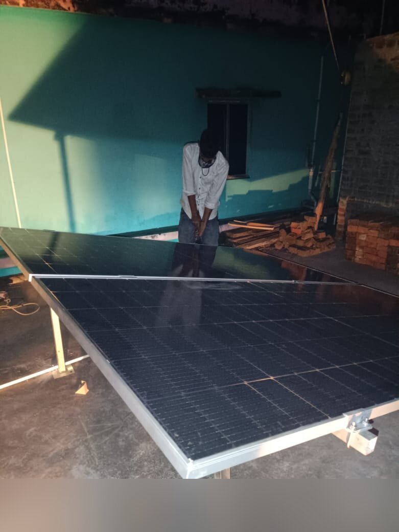 Solar panel installation at night