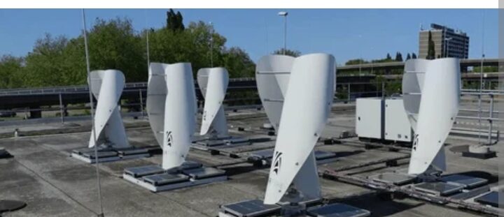 Array of vertical axis wind turbines on a rooftop