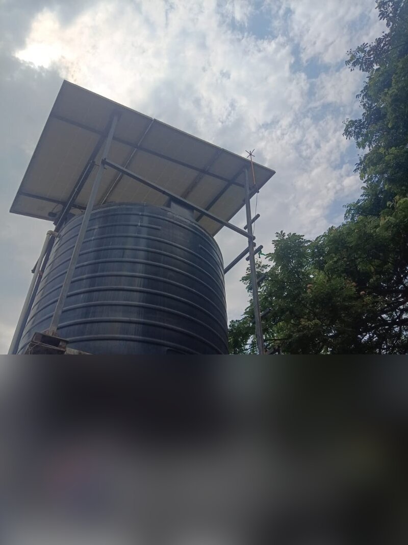 Solar panel installation with water tank
