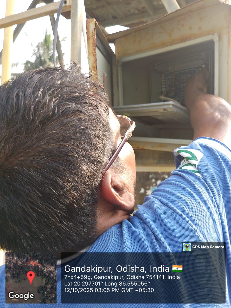 Technician repairing VFD panel at RWSS solar pump site, Gandakipur, Jagatsinghpur